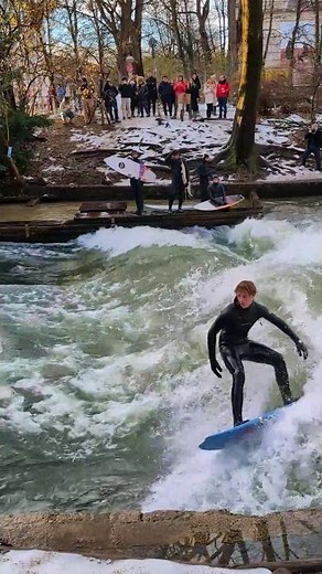 Winter surfing on Isar-Eisbach in Munich with spectacular top performances