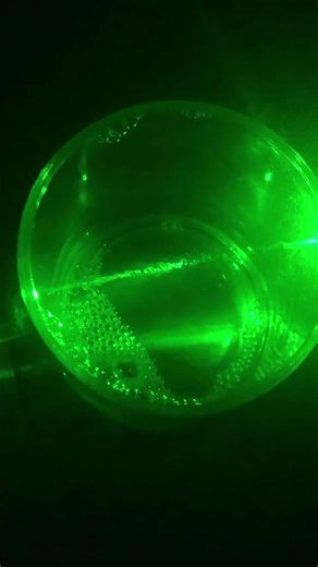 Laser light in soap bubble