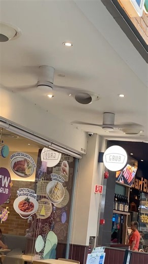 2 modern ceiling fans at a restaurant