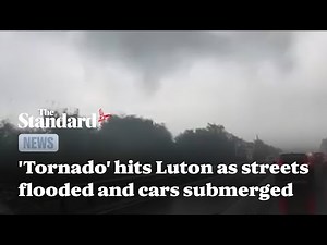 UK weather: 'tornado' hits Luton as streets flooded and cars submerged outside London