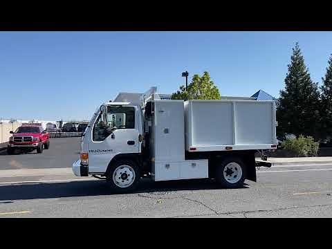 1999 Isuzu NPR HD 8' Flatbed Dump Truck for Sale