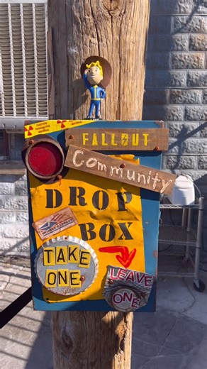 Mrs.Fallout👩‍🔧 on Instagram: "I made this “Take One Leave One” Fallout Community Drop Box for the Goodsprings Pioneer Saloon in Nevada for the Fallout Fan Celebration this weekend. I did not film making this because we made it last second right before we left for Vegas! I used a blue metal parts box I got at a flea market for $5. And then a lot of spare scraps of things I had! I wanted to contribute something for the Fallout community and thought this would be fun! It was a blast to make and s