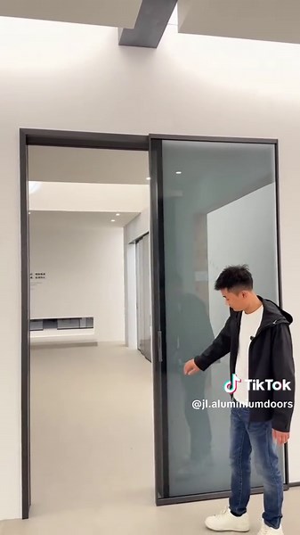 Trackless Ghost Gate: Innovative Aluminium & Glass Door