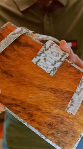 Hayu Widyas Boutique on Instagram: "Tas dari kulit asli itu tampilannya selalu sama? Atau justru tiap tas punya karakter uniknya sendiri? Zelt bag Python series kombinasi Cowhair size 27cm, penuh kejutan yg menciptakan harmoni antara lembut & eksotis. Dan yang paling penting, buatan lokal dengan material kulit asli dari Hayu Widyas Handmade ❤️🤍 #taswanita #hayuwidyashandmade #buatanlokal #tasmewah #oldmoneystyle"