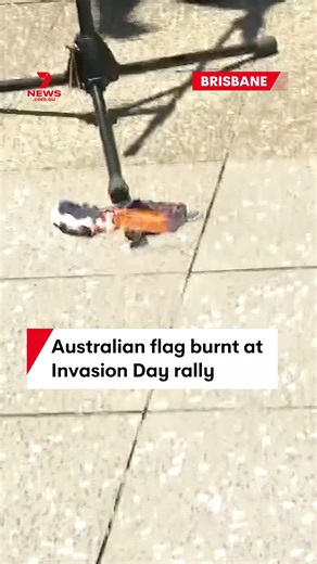 402K views · 5K reactions | Protestors have set the Australian flag on fire at the Invasion Day rally, in Brisbane. Some can also be seen spitting on the burnt remains. #AustraliaDay #InvasionDay #Australia #Brisbane #Queensland | 7NEWS Brisbane | Facebook