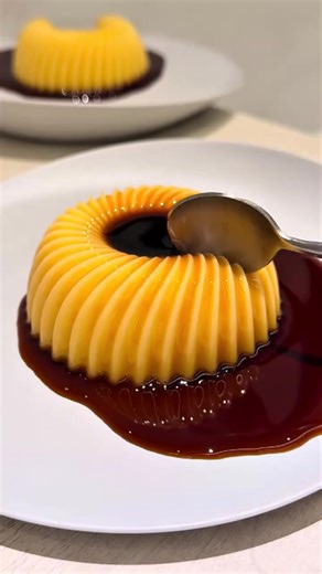 This is the most satisfying dessert video you will see all day. Wait until the spoon cuts through that perfect caramel flan. | Chefclub Network