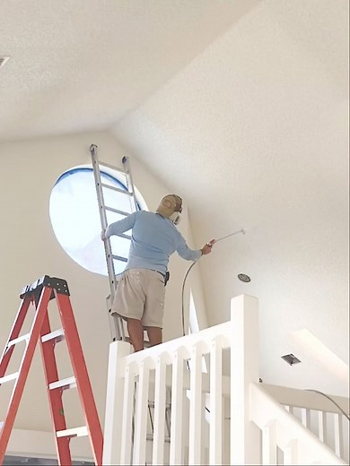 Spraying Simply White OC-117 over the popcorn texture, and the...