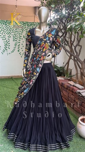 Kadhambari Studio on Instagram: "Price :13800/- A black contemporary georgette micro-pleated lehenga, elevated with rich gota borders that add just the right hint of festivity. The dupatta steals the spotlight — hand-painted Kalamkari, delicately enhanced with hand embroidery embellishments, making every drape a work of art. Paired with a statement blouse featuring multicolour mirror embroidery, finished with Kalamkari sleeves and hand embroidery for a soulful, artisanal touch."