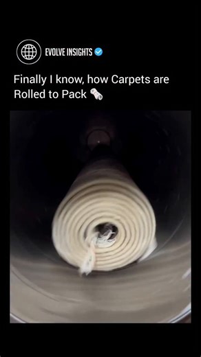 Evolve Insights on Instagram: "This video reveals an automated carpet-rolling machine that tightly winds large rugs onto a central core using controlled rotation and centrifugal force. 🌀 Instead of heavy manual labor, the system spins and guides the carpet evenly, maintaining uniform tension for compact, perfectly shaped rolls — all while dramatically speeding up production. ⚙️🧶 What’s fascinating is how often this machine gets misidentified. Many viewers think it’s a washing machine, which sh