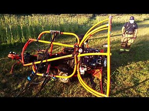 Powered parachute pilot with five-year-old passenger crashes into utility static wire