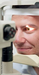 Eye exam, man and optometry for vision, medical and healthcare consultation with glaucoma, lens or iris check. Patient with split lamp, light or laser tech machine for scanning in ophthalmology test