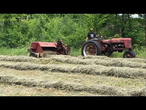 Old school haying with farmall H and new holland equipment
