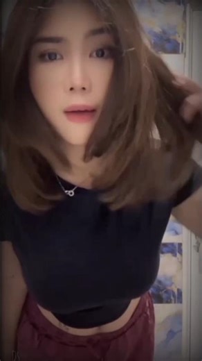 Her stomach is tattooed showing off her nipples #dance #danceshorts #cute