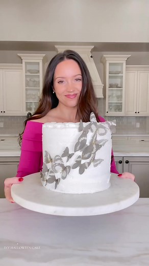 DIY HALLOWEEN CAKE for when you’re in a pinch or on a budget 🖤 STEP 1: Remove the unwanted colorful frosting when frozen. This keeps all the colors from spreading. As the frosting thaws, smooth it all out. OR ask the bakery for extra buttercream and they’ll sometimes give you extra! STEP 2: Garnish with edible items that match your party theme. I’m using edible butterflies from AMAZON Definitely give this DIY cake trick a try for your next birthday party, Halloween party OR Holiday party! Some 