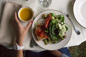 A true farm-to-table dinner highlights organic vegetables with a campfire feel