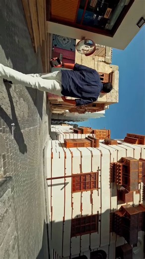 Favaz | Travel Photographer | Filmmaker on Instagram: "Walking through Al-Balad, the historic heart of Jeddah 🇸🇦 Ancient coral-stone houses, wooden rawasheen, and centuries of stories still alive today. #jeddah #albalad #old_town #visitsaudi #saudi"