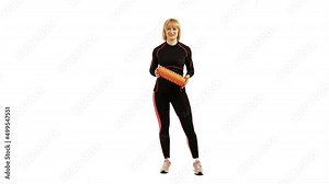 Demonstrating a acupuncture foam roller for aerobic classes