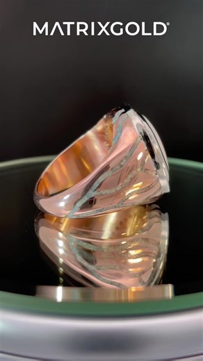 This stunning opal ring, created in 14k rose and white gold with black diamonds and crushed white opal veins, was designed in MatrixGold by James Sullivan of Shannon Jewelers. He created it after completing our Level 3 Master Class in October, putting his newly learned advanced techniques into practice. Register for our upcoming MatrixGold Certifications: https://bit.ly/4rkhZCn #jewelrydesign #jewelry #design #jewellery #rhino3d #jewelrydesigner #jewelrymaking #designer #3drender #customjewelry 