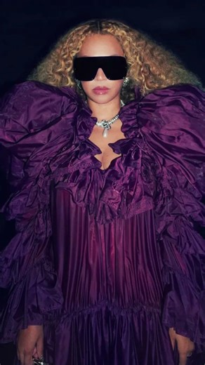 Beyoncé Stuns in a Voluminous Deep Purple Saint Laurent Dress