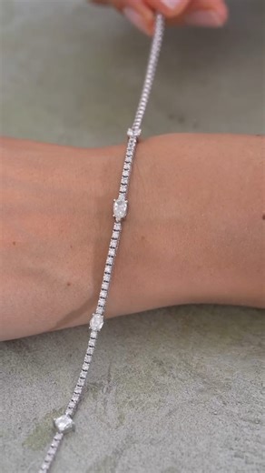 A diamond tennis bracelet, reimagined. Featuring our L’Amour Crisscut® diamonds — precision-cut to sparkle brighter, appear larger, and radiate brilliance from every angle. | Christopher Designs