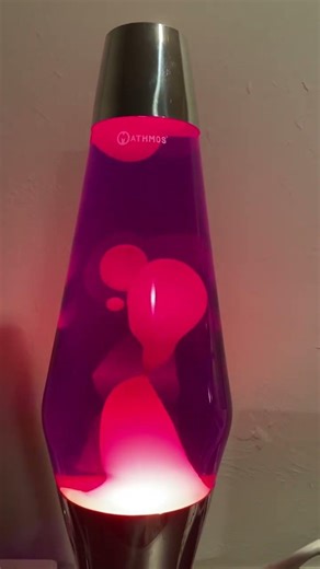 Mathmos Astro Lava Lamp Violet/Orange (lit room)