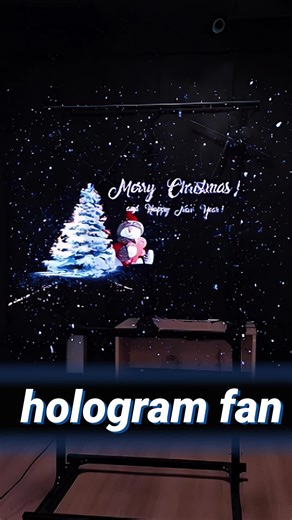 Hologram Fan Christmas Display — 3D Floating Tree & Snow ✨🎄 Hologram fan Christmas display with a full 3D floating tree, snow effects, and Merry Christmas animation. This hologram fan setup creates a stunning 3D holiday wall with no screen and no projector. Perfect for shops, malls, events, and Christmas decorations.#hologramfan #hologramfanchristmas #hologramfandisplay #hologramfananimation #hologramfanwall #3dhologramfan #hologramfantechnology #hologramfanchristmastree #hologramfansnow