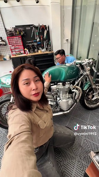 Exploring a Classic Green Motorcycle in Workshop
