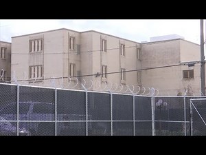 St. Landry Parish President Jessie Bellard examines evidence in jail break