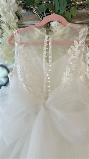 New design alert  ✨ Introducing the Lacy gown to our 23/24 flower girl / communion collection  She has the fullest skirt you ever did see , huge tulle bow , sparkle corset & shimmer button back . Made to measure luxury gown . Book your fitting today or pop us a message to order online ✨✨✨✨ #flowergirldress #communiondress #ukflowergirlboutique #ukholycommuniondresses #luxurykidsfashionbrand | Little Betty's Boutique | Facebook