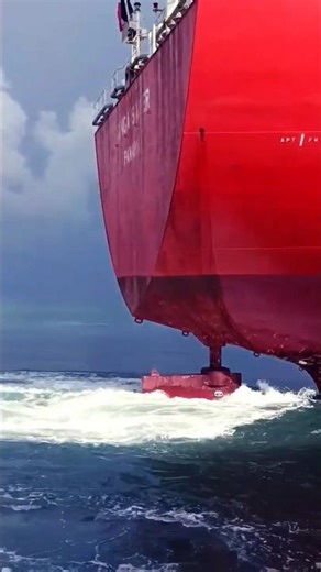A tug boat pulling a large Chemical tanker ship