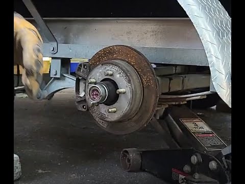 Fixing-lubricating stuck surge brakes on a boat trailer. Very simple to do in the driveway.
