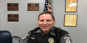 Terminally ill Harrison officer honored for 30 years of service