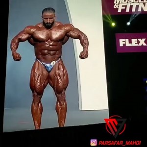 Hany Rambod on Instagram: "Even though @hadi_choopan is hearing impaired he still uses the vibration of the music to time his poses. During the @mrolympiallc competitions I rarely get to truly appreciate the posing routine of the competitors. I’m constantly trying to find aspects we can improve upon even during the actual competition with text messages being sent back and forth with my athletes. This way they can make adjustments as soon as they get back stage. Great job to the people champ on t