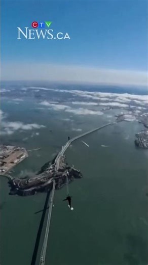 Man skysurfs San Francisco’s Bay Bridge