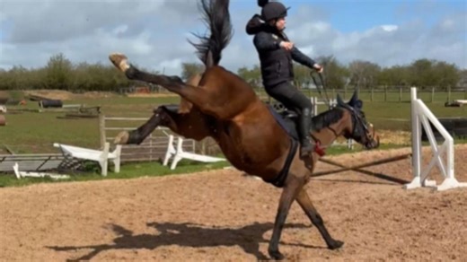 Rider falls hard after horse suddenly becomes uncontrollable