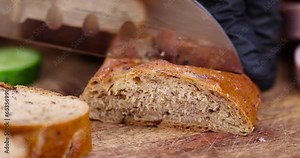 cut soft fresh bread with the addition of various grains and cereals, close-up of soft multi-grain bread