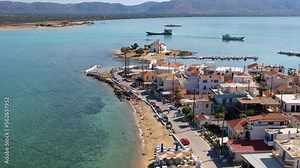 Aerial view of Elafonisos main village. Located in south Peloponnese Elafonisos is a small island very famous for the paradise sandy beaches and the turquoise waters.