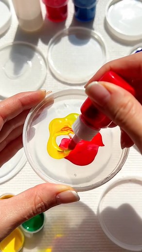 6.7K views · 119 reactions | DIY Suncatcher Craft Materials: Assorted clear plastic lids (yogurt, sour cream, etc.) Clear school glue Food coloring or liquid watercolor paint | Easy Recipes | Facebook