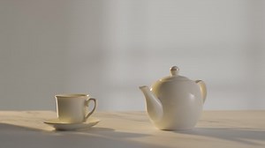 Free stock video - Studio shot of making traditional british cup of tea using teapot 1