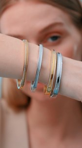 16K views · 56 reactions | Bangles reimagined: sleek, strong, stylish. Our designs are easy to slip on and sit comfortably on the wrist. They add radiant accents that are modern, minimalist, and effortlessly versatile. | BERING | Facebook