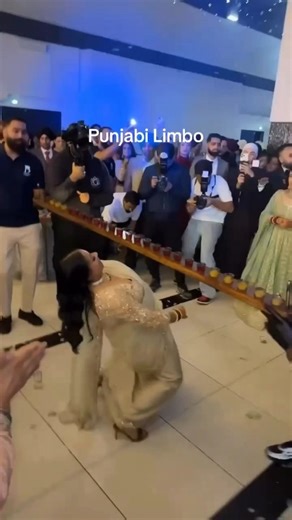 Shubha Vivahh on Instagram: "When Punjabi swag meets limbo vibes 🔥🎶 Follow @shubhavivahh for more wedding Inspirations Dm to get your wedding Featured ❣️ . . . Courtesy @s.shrn11 @prestabar 🔥 #shubhavivahh #PunjabiLimbo #WeddingVibes #ShaadiFun [ Wedding Reels , Wedding Content creator , Punjabi, limbo, dance, sangeet, friends, celebration , wedding game ]"