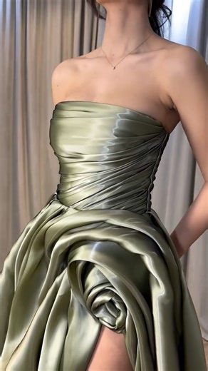 VK | A dreamy pistachio-hued gown in liquid fabric, inspired by the elegance of carnations. Its fluid silhouette and soft shimmer create a... | Instagram