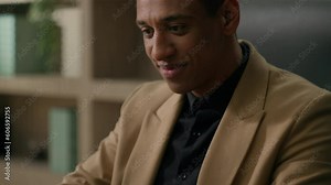 Moving shot male hands typing laptop keyboard pressing computer buttons African American guy ethnic man male ceo businessman entrepreneur chief smiling office employee manager working online at office