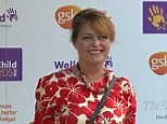 Janet Ellis looks radiant in red at the Well Child Awards