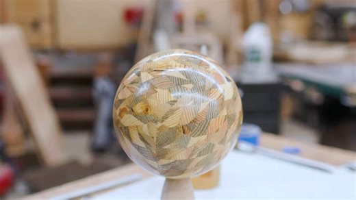 A Striking Chaotic Pattern Wooden Sphere Made Out of Triangular Cuts of Pine Scrap