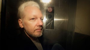 Two conflicting portraits of Assange as extradition hearing opens
