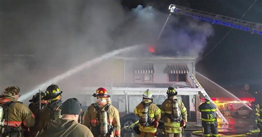 Firefighters battle three-alarm Christmas fire spread through two buildings in Carbon County
