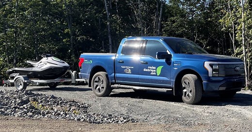 Ford F-150 Lightning electric pickup charges electric jet ski while driving