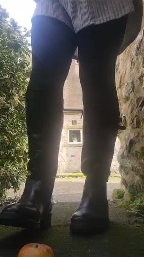 Apple Crushing with Black Riding Boots in Public