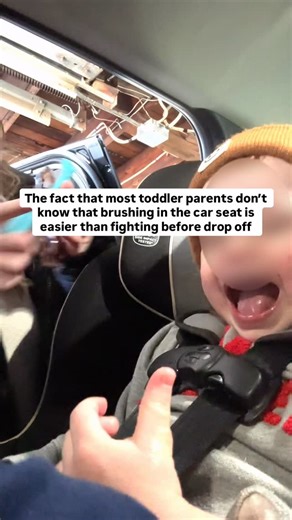 Emily 🦷 toothbrushing tips for parents on Instagram: "If you’ve given up on brushing your toddler’s teeth without a fight, I get it. This might look unhinged, but brushing in the car seat can be easier than trying to do it at home before drop off. They’re safely strapped in, the lighting is good, and you can actually focus on brushing instead of chasing or negotiating. Around 18 months many toddlers discover their independence and start to resist brushing. It’s normal, frustrating, and it’s usu